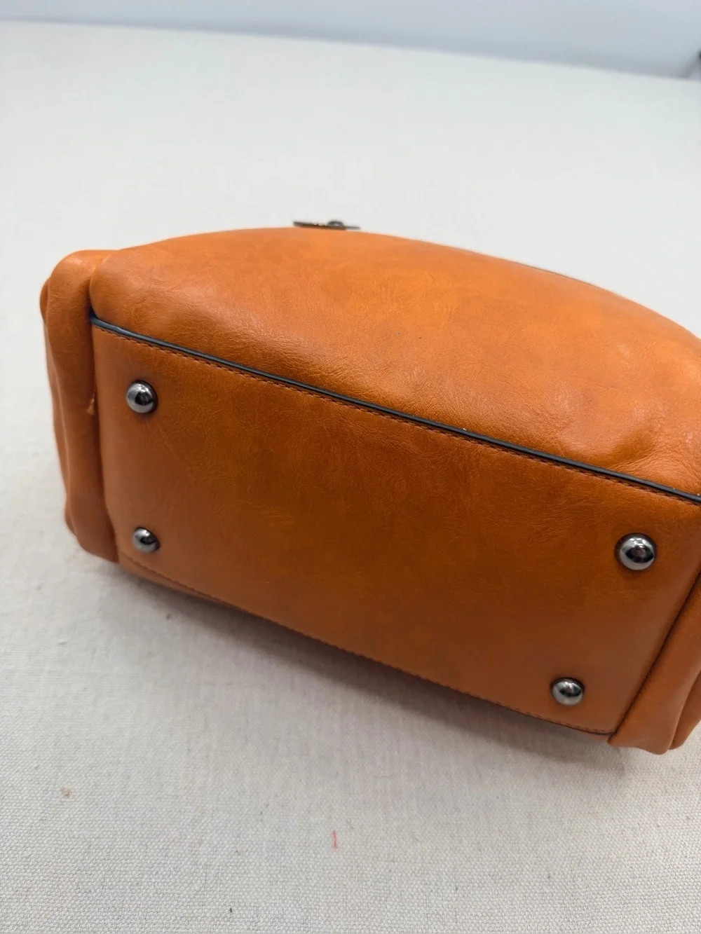 Structured Orange Satchel with Tassel Accent